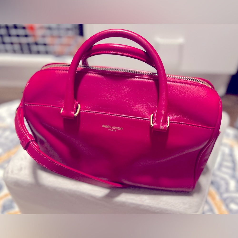 YSL 💕 Yves Saint Laurent Pink smooth leather baby duffle! W/crossbody st…